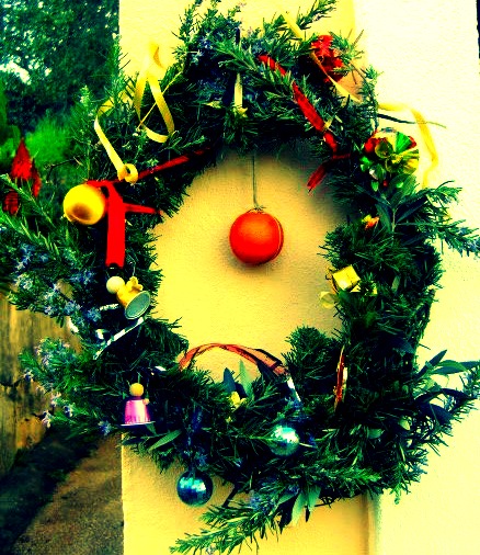 The Christmas wreath at our door this year. Yes, that is a real orange in the centre.