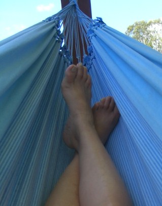 Feet firmly planted in a hammock